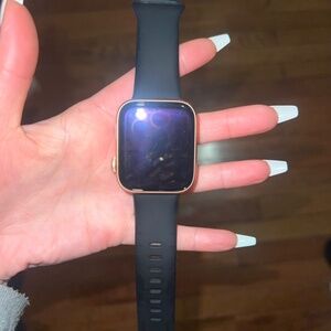 Apple Watch SE 44MM Rose Gold with black band